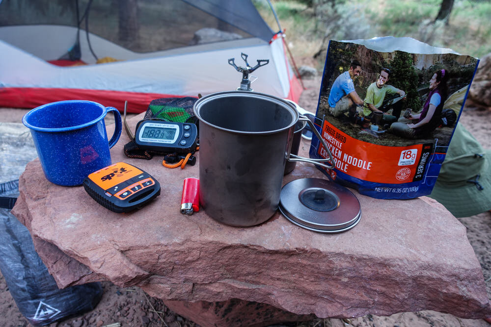 Mountain House’s Homestyle Chicken Noodle Casserole is one of our favorite Four-Squirrel rated meals. Also pictured above, we used the BRS Stove with the Snow Peak Mini Solo Cookset to boil water for our meals.